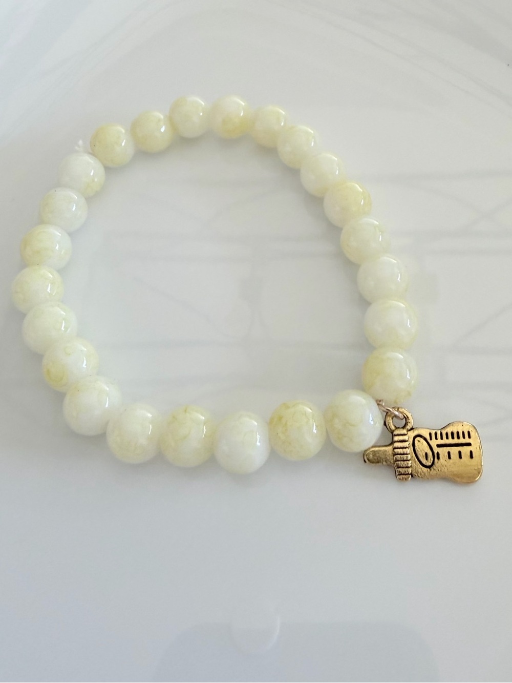 Baby Yellow Beaded Stretch Bracelet with Gold Baby Bottle Charm New Baby Gift